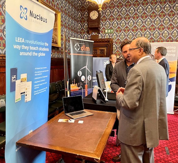 Shailesh Vara, MP for North West Cambridgeshire (in foreground) Learns about LEEA's learning platform from Tom Newton of Nucleus Learning